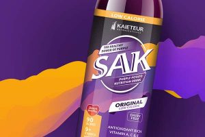 Sak bottle against colourful abstract background